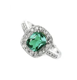 ANILLO ORO 18 KILATES CON DIAMANTES Y ESMERALDA