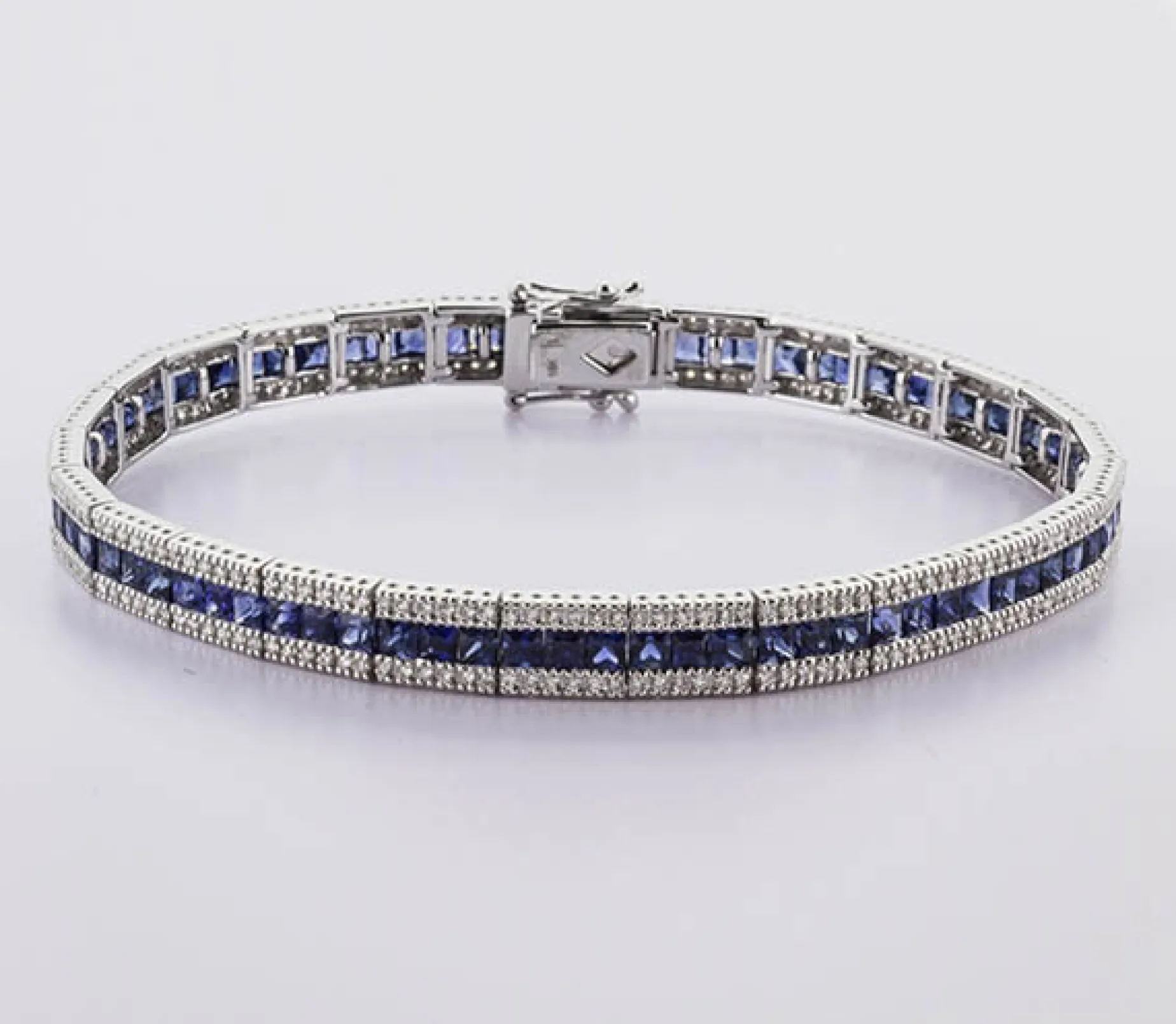 PULSERA ORO 18 KILATES CON DIAMANTES Y ZAFIROS